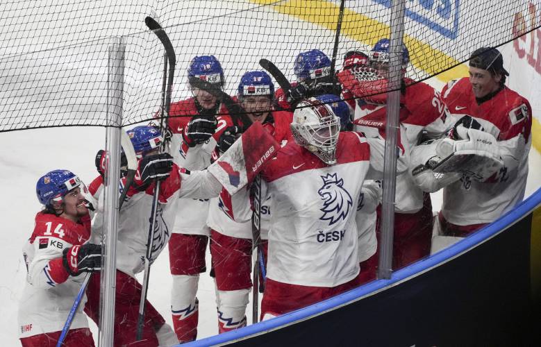 Czechia players celebrate their win over Canada in a quarterfinal match at the IIHF World Junior Hockey Championship in Gothenburg, Sweden, Tuesday, Jan. 2, 2024. Christinne Muschi/The Canadian Press via AP)