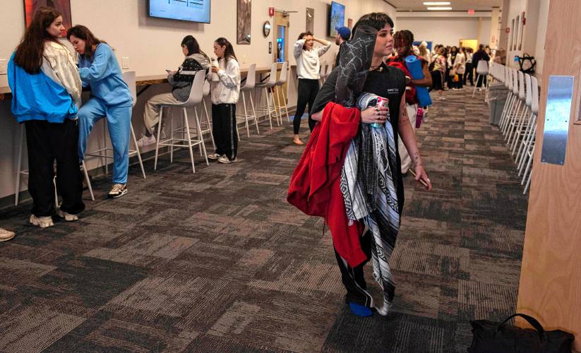 Students make their way to their classes at CLI Conservatory Monday morning, March 11, 2024.