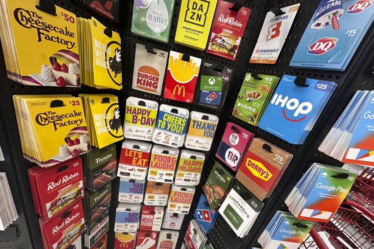 Gift cards are displayed at a Target store, in New York, in December. Americans were expected to spend nearly $30 billion on gift cards this holiday season, according to the National Retail Federation. 
