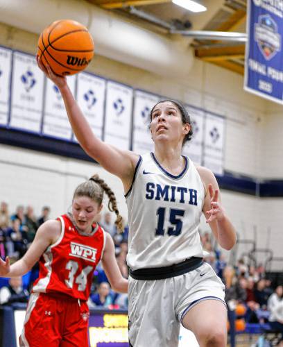 Smith College forward Sofia Rosa (15) goes in for a layup against WPI earlier this season at Ainsworth Gymnasium in Northampton.