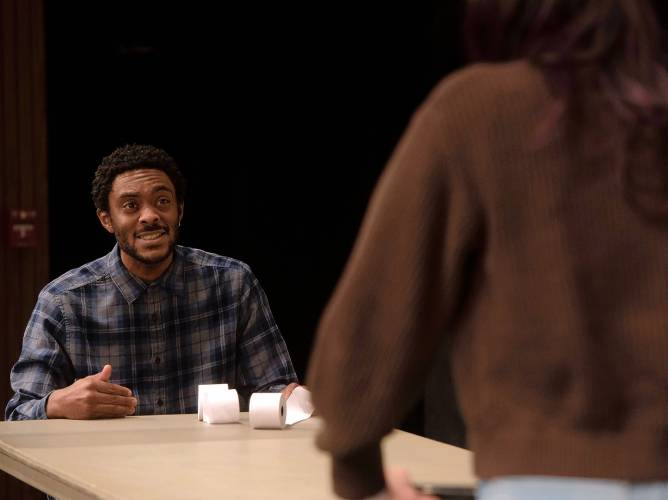 Matthew Haughton, left, who attends Holyoke Community College through the state’s new MassReconnect program, practices his role as Will  in a play called “A Bright New Boise.”