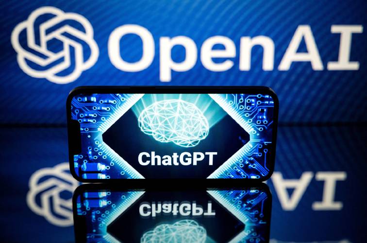 This picture shows screens displaying the logos of OpenAI and ChatGPT.