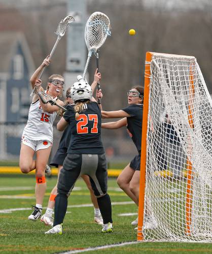 South Hadley’s Maddy McArdle (15) sends a shot just wide of the goal in the second quarter against Belchertown on Thursday in South Hadley.