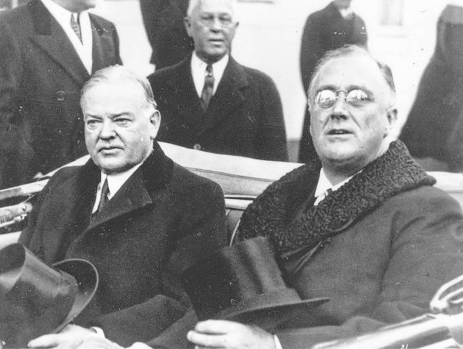 Franklin D. Roosevelt and Herbert Hoover in Washington, D.C. on March 4, 1933.