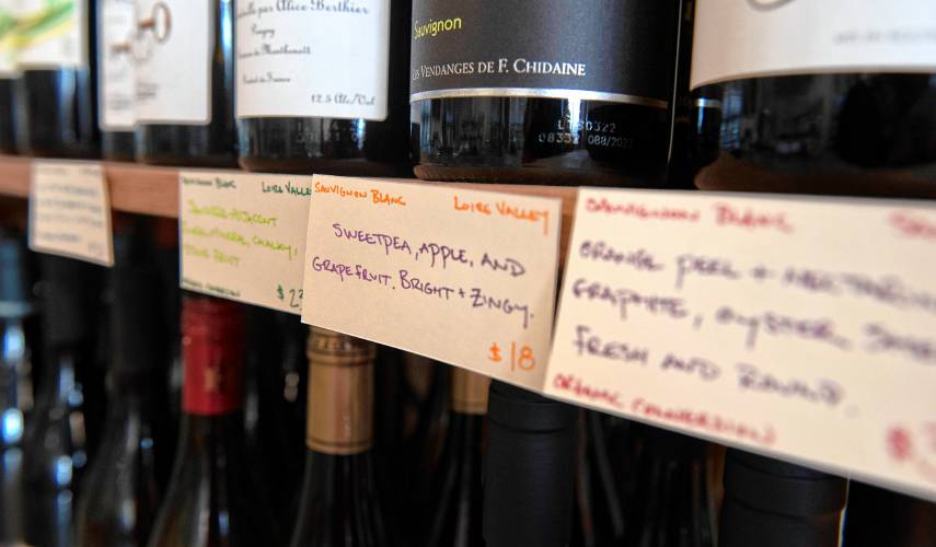 Wines and their descriptions at Tip Top Wine Shop, owned by Lauren Clark and Miranda Brown in Easthampton. 