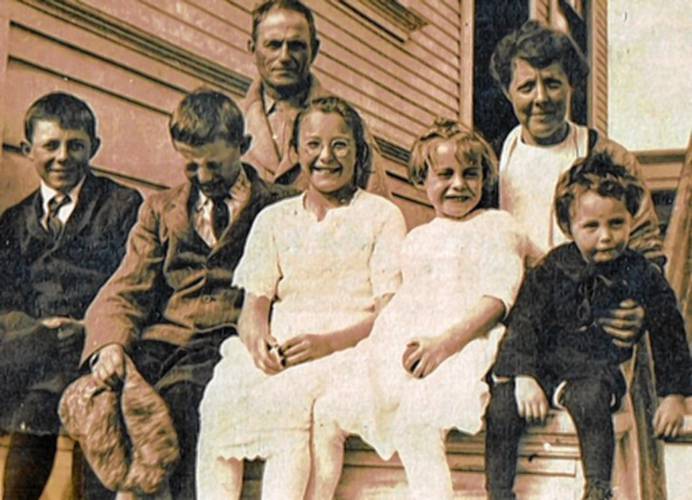 Six-year-old Alice Marble, second from right in front row, is seen here with her family on the steps of their San Francisco home in 1919.