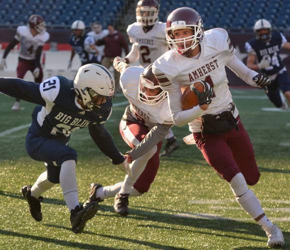 Amherst’s Shane Robles, right, shown here against Swampscott in the 2019  Division 5 Super Bowl, is a walk-on with the UMass football team this season. 