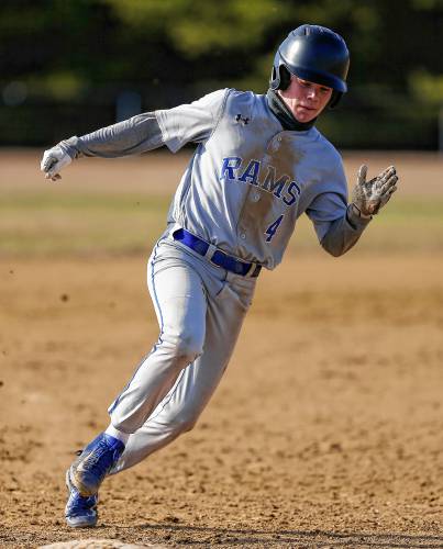 Granby baserunner Colin Murdock (4) rounds third base to score against Smith Academy in the bottom of the first inning Friday in Granby.