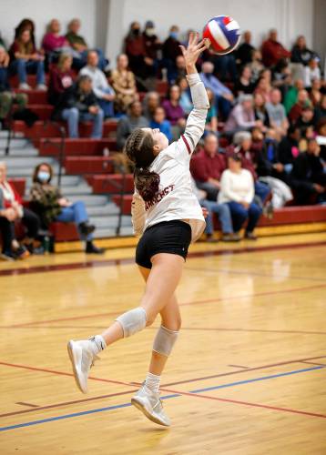 Amherst’s Liza Beigel (1) serves in the fourth set against Holliston during the MIAA Division 3 quarterfinal Thursday in Amherst.