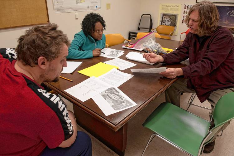Thane Thomsen, an instructor with the Literacy Project, teaches a high school equivalency test class in Easthampton to Peter Morris and Sharon Beeson-Nelson. The Literacy Project has expanded to Easthampton, its seventh location in the Pioneer Valley.
