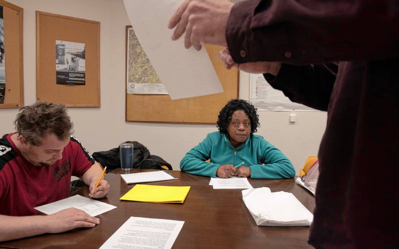Thane Thomsen, an instructor with the Literacy Project, teaches a high school equivalency test class in Easthampton to Peter Morris and Sharon Beeson-Nelson. The Literacy Project has expanded to Easthampton, its sixth location in the Pioneer Valley.