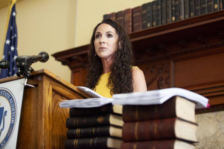 Auditor Diana DiZoglio tells reporters on July 26, 2023 that she wants to pursue litigation against the House and Senate, where top Democrats have “stonewalled” her attempts to audit them.