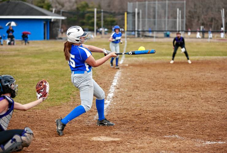 Granby’s Jordyn Placzek (15) blasts a triple to bring in three runs against Smith Academy in the bottom of the fourth inning Wednesday in Granby.