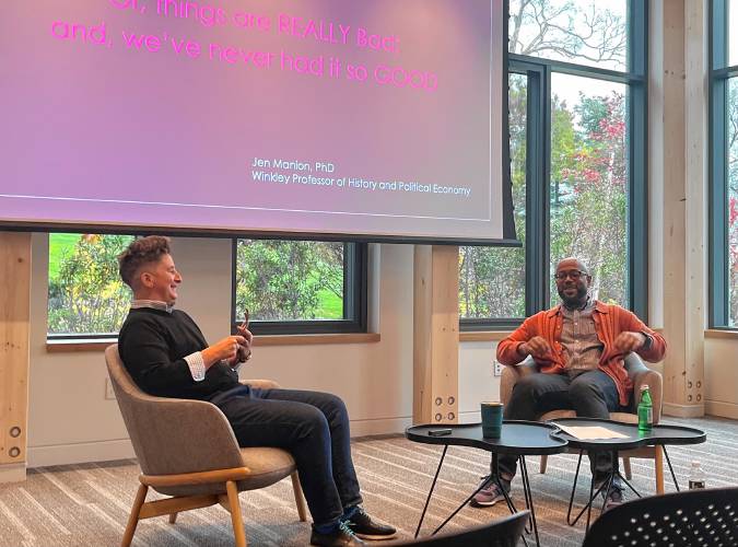 Professor Jen Manion (left) and Professor Khary Polk (right) discuss anti-LGBTQ sentiment and legislation at an Amherst College discussion.