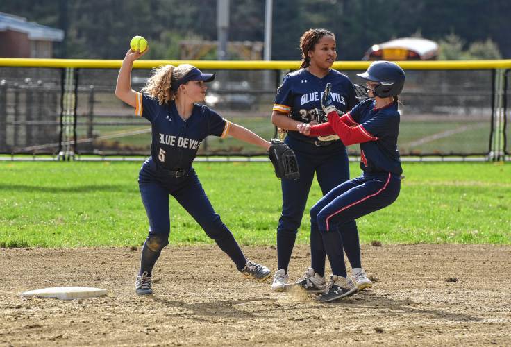 Northampton shortstop Haly Doucette-Kaplan (5) readies for a throw to first base after tagging second  against Mahar during Franklin County League East action on Monday in Orange. Mahar runner Dakota Cleveland (4) was out on the force play.