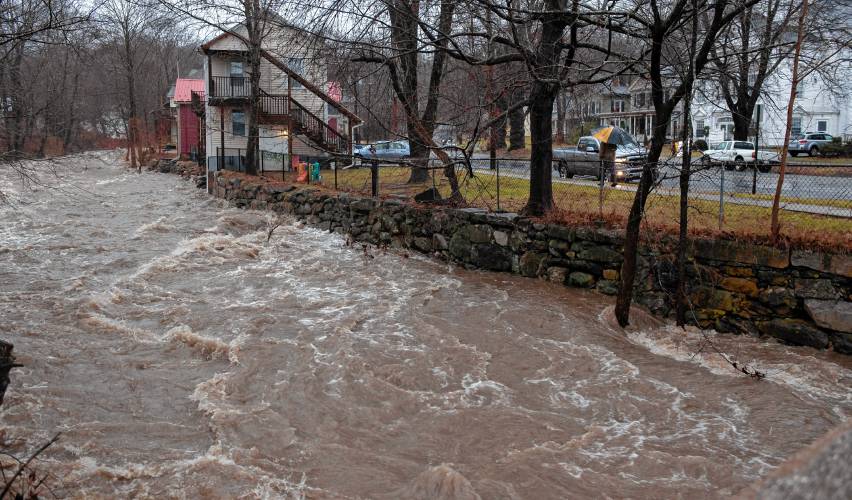 The Mill River  at a very high level in Williamsburg during the flooding on Monday. 