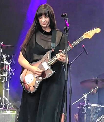 Madison Cunningham performs at the Winnetka Music Festival in Winnetka, Illinois in June 2023. More often than not, Cunningham plays electric guitar rather than acoustic.