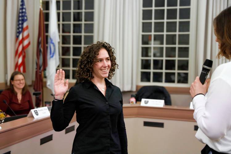 District 5 Councilor Ana Devlin Gauthier is sworn is as vice president of the Amherst Town Council by Clerk of the Council Athena O’Keeffe on Tuesday night at the Amherst Town Hall. 
