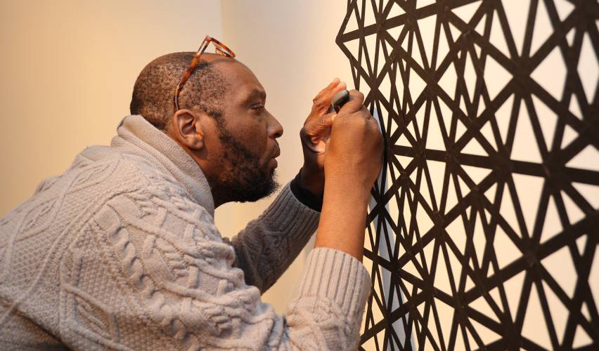 Holyoke Community College visual art professor Raishad J. Glover of Northampton will talk about his art during a Black History Month celebration on Thursday.