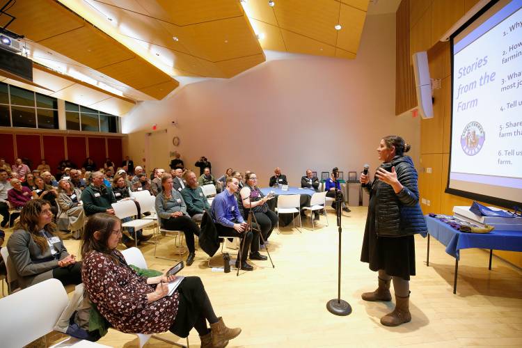 Julia Coffey of Mycoterra Farm speaks during the annual Farmer Appreciation Party held by the Harold Grinspoon Charitable Foundation on Wednesday evening at the Smith College Campus Center in Northampton.
