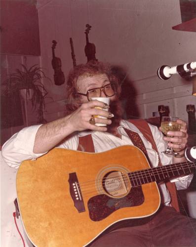 Folk singer, storyteller, multi-instrumentalist, songwriter, and sea-chanteyman Tom Callinan performing at the Iron Horse on Decmber 31, 1980.