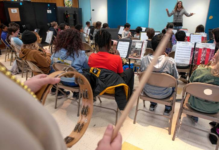 Ariel Templeton, a music teacher for the Amherst Elementary Schools, teaches band at Wild Wood on Wednesday afternoon, Feb. 14, 2024. 