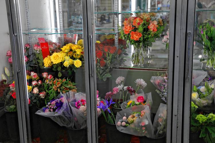Flowers wait for customers at Carey’s Flowers