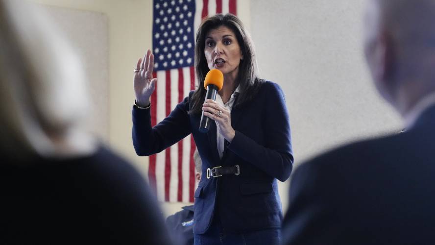 Republican presidential candidate former UN Ambassador Nikki Haley talks to students, parents and educators during a campaign stop at the Polaris Charter School on Friday.