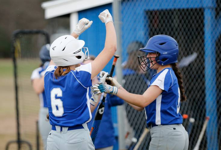 Granby’s Cassie Flaherty (6) celebrates after scoring against Smith Academy in the bottom of the fifth inning Wednesday in Granby.