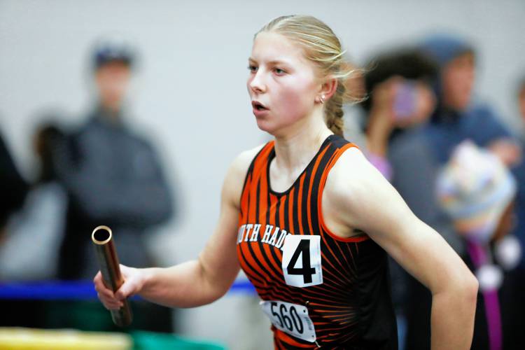 South Hadley’s Allison Fleury competes in the girls 4x200 meter relay during the PVIAC indoor track meet Wednesday at Smith College in Northampton.