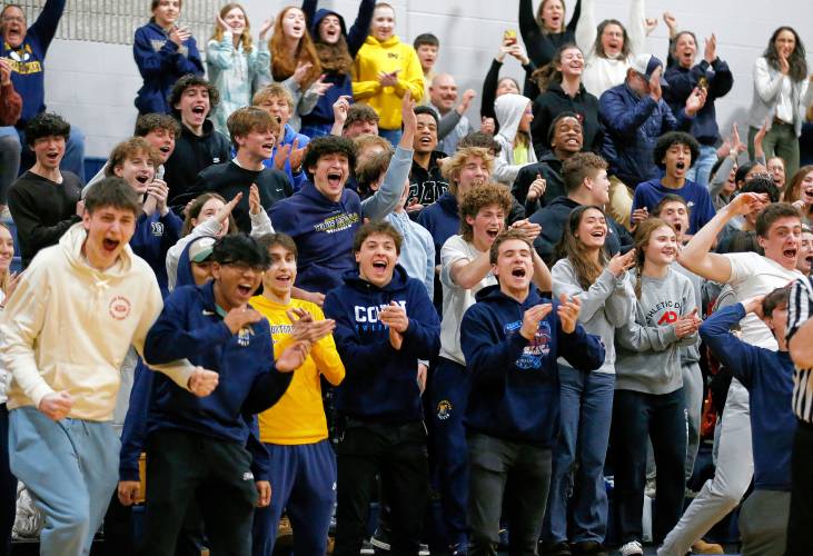 Northampton fans cheer after a basket by Bri Heafey (5) against Mansfield in the fourth quarter of the MIAA Division 2 girls basketball round of 16 game Tuesday night in Northampton.