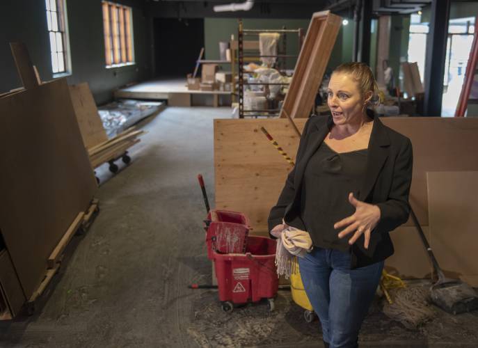 Gabrielle Gould, the executive director of the Downtown Amherst Foundation, stands in The Drake during its last phase of contemplation before it opens on April 26.