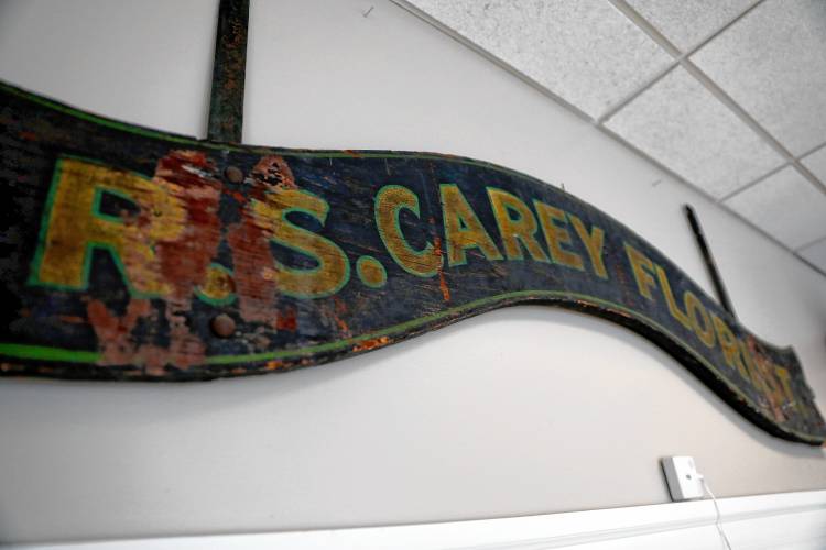FAR LEFT: Carey’s Flowers has been a South Hadley fixture for more than 100 years.