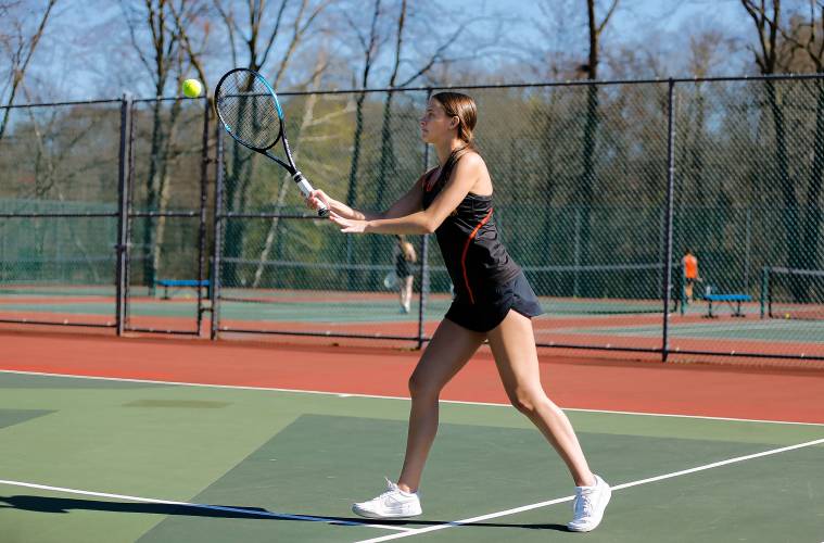 Belchertown’s Mia Corish returns a shot while competing in the No. 1 doubles match with Emalee Chaisson against South Hadley’s Madison Bruso and Grace O’Shea 