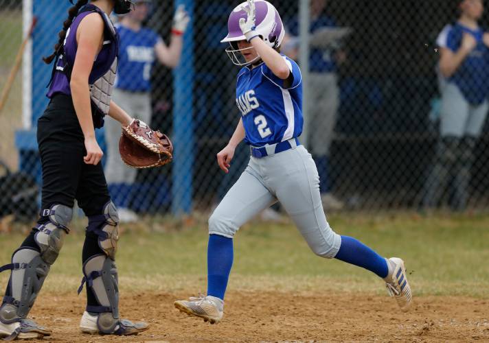 Granby baserunner  Sydney Chateauneuf (2) scores against Smith Academy in the bottom of the third inning Wednesday in Granby.