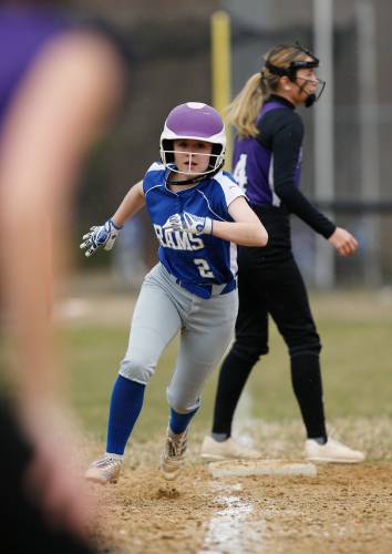 Granby baserunner  Sydney Chateauneuf (2) sprints home to score against Smith Academy in the bottom of the second inning Wednesday in Granby.