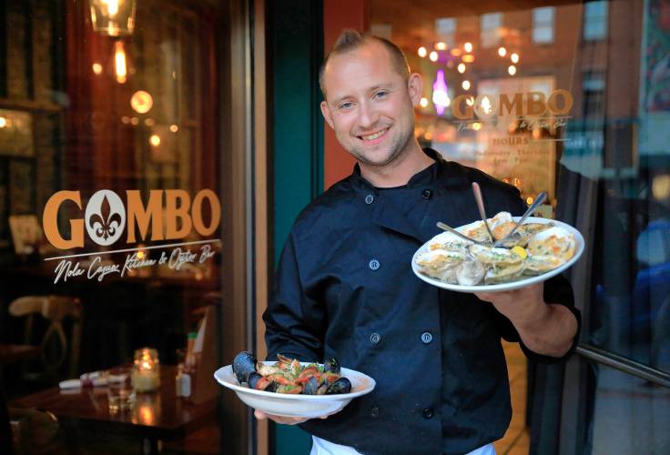 Owner and chef John Piskor with his jambalaya and grilled oyster dishes at Gombo Nola Kitchen & Oyster Bar on Main Street in Northampton.