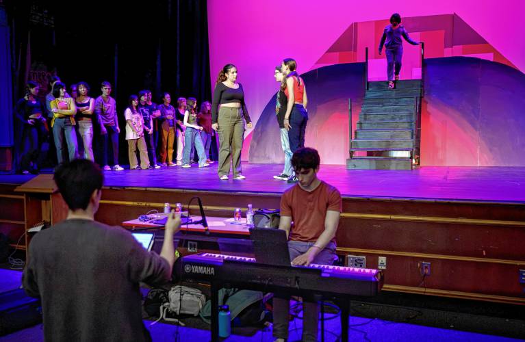 The cast of Northampton High School’s production of “Freaky Friday” rehearse on a recent evening at the high school auditorium.