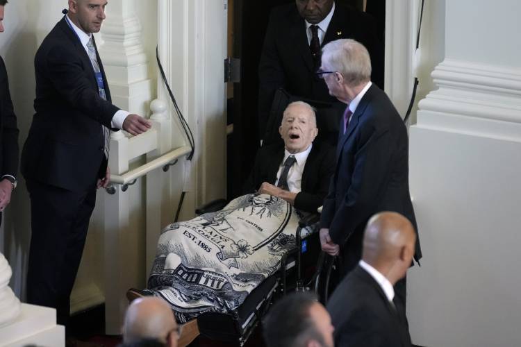 Former President Jimmy Carter arrives to attend a tribute service for his wife and former first lady Rosalynn Carter at Glenn Memorial Church in Atlanta on Tuesday.