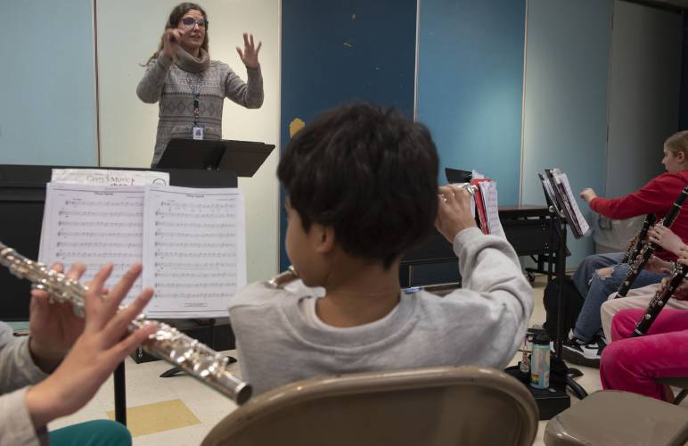 Ariel Templeton, a music teacher for the Amherst elementary schools, teaches band at Wildwood.