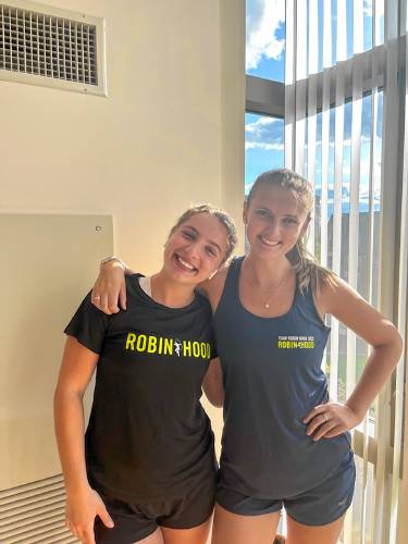 Best friends Giulia Salvucci and Ruby Donnelly, UMass students, will run in the New York City Marathon on Sunday. The duo have raised $10,000 for the charity Robin Hood. 