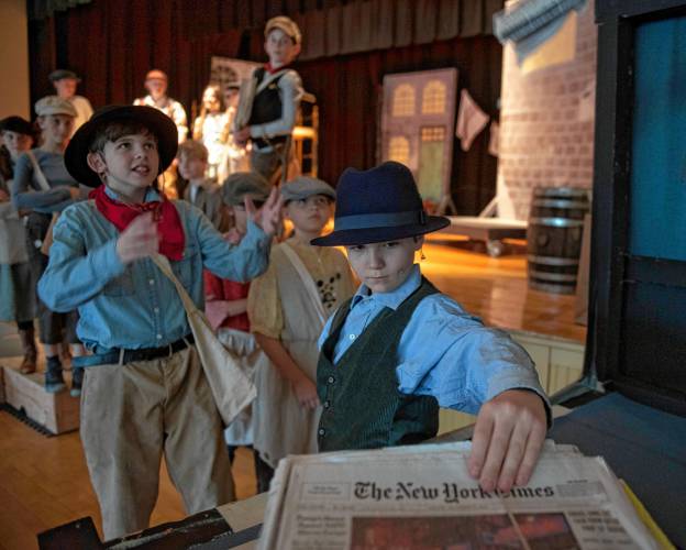 Abe Kellogg and Elliott-Scully-Henry, students at the Anne T. Dunphy Elementary School in Williamsburg, during a rehearsal for “Newsies Jr.” being performed Friday, April 5-6.