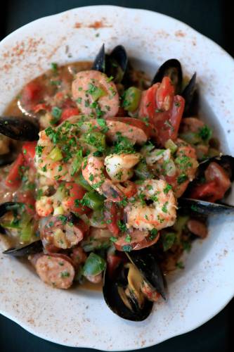 The seafood jambalaya dish with mussels, shrimp, crawfish, andouille sausage, trinity and tomato simmered with Acadian spices and Carolina rice at Gombo Nola Kitchen & Oyster Bar on Main Street in Northampton.