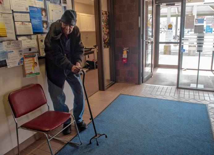James McClure waits for a wheelchair or walker to make his way down the hall to the Amherst Senior Center. McClure likes to come on Wednesdays because he goes to programs that run on each of the three floors. But as the town waits for a part to fix a broken elevator, he says, “I use every floor; now I’m limited. 