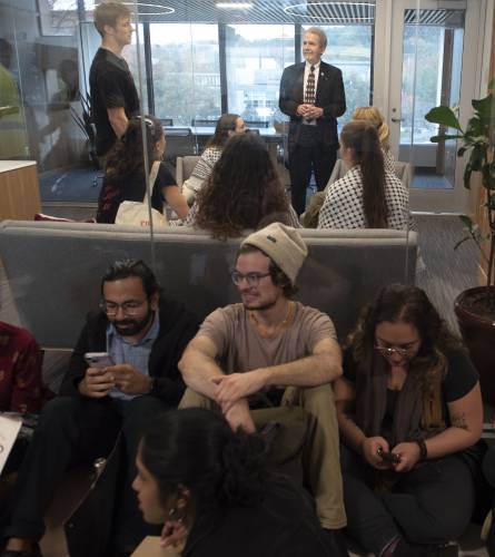 UMass students present demands to interim Provost Mike Malone in the chancellor's office in Whitmore during a walkout and sit-in event on Oct. 25 to demand that the university cut ties with weapons manufacturers and condemn Israeli actions in Gaza.
