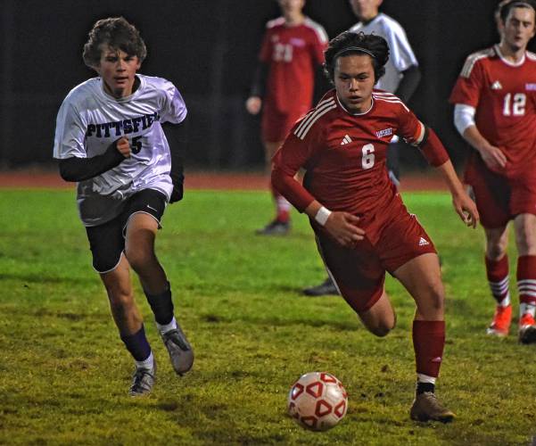 Hampshire’s Aidan Moynahan (6), right, dribbles the ball through the midfield against Pittsfield during the Raiders’ 5-1 win in the MIAA Division 4 Round of 16 Tuesday night at Dorunda Field in Westhampton. 