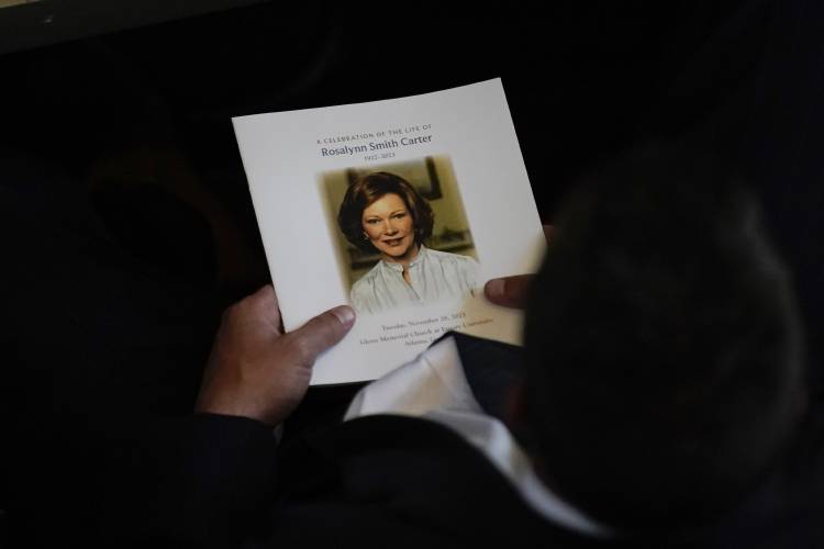 Attendees are seated before a tribute service for former first lady Rosalynn Carter at Glenn Memorial Church on Tuesday in Atlanta.