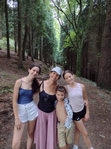Paula Garcia, 53, died about a month ago in a car crash while coming home from visiting her family in Spain. Friends say her family was her top priority. She is seen here with her three children. 