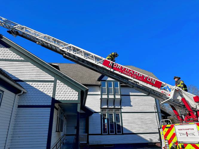 Northampton firefighters practice this month with a new ladder truck at the Bombyx Center in Florence. Officials at the arts center say they’re developing a new rapport with the department after it briefly shut down live music there last spring due to safety concerns.