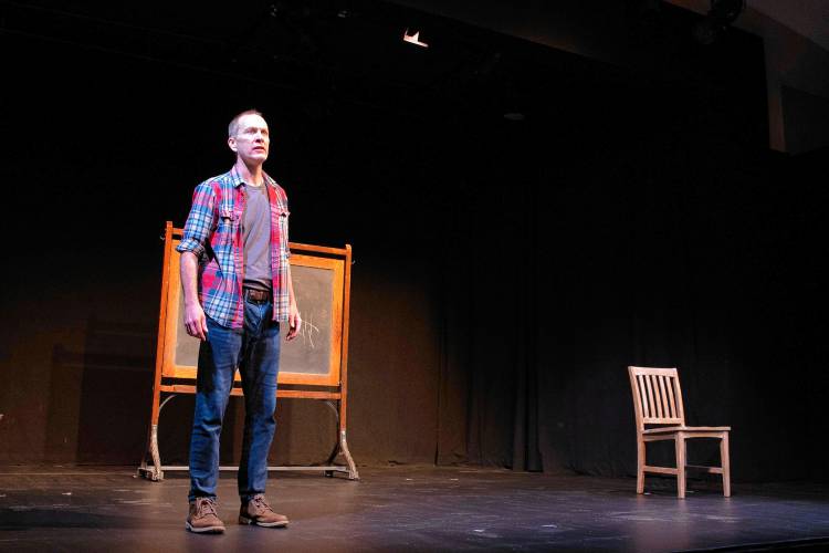Jay Sefton in a scene from his one-man play “Unreconciled.” The production, at CitySpace in Easthampton, examines abuse he suffered as a teen by a Catholic priest while working on a school play and his effort to come to terms with it as an adult.